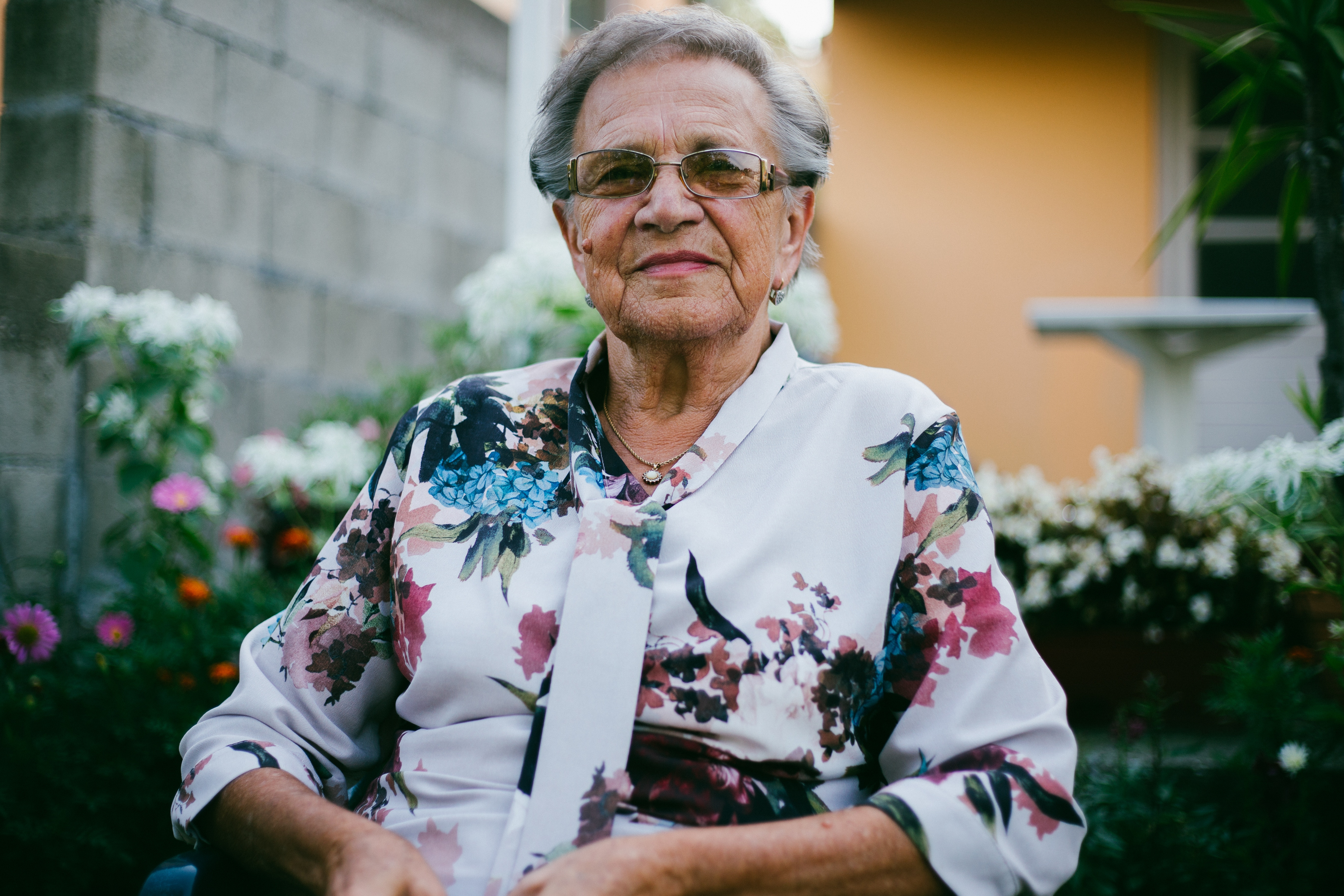 Elderly woman sitting in chair